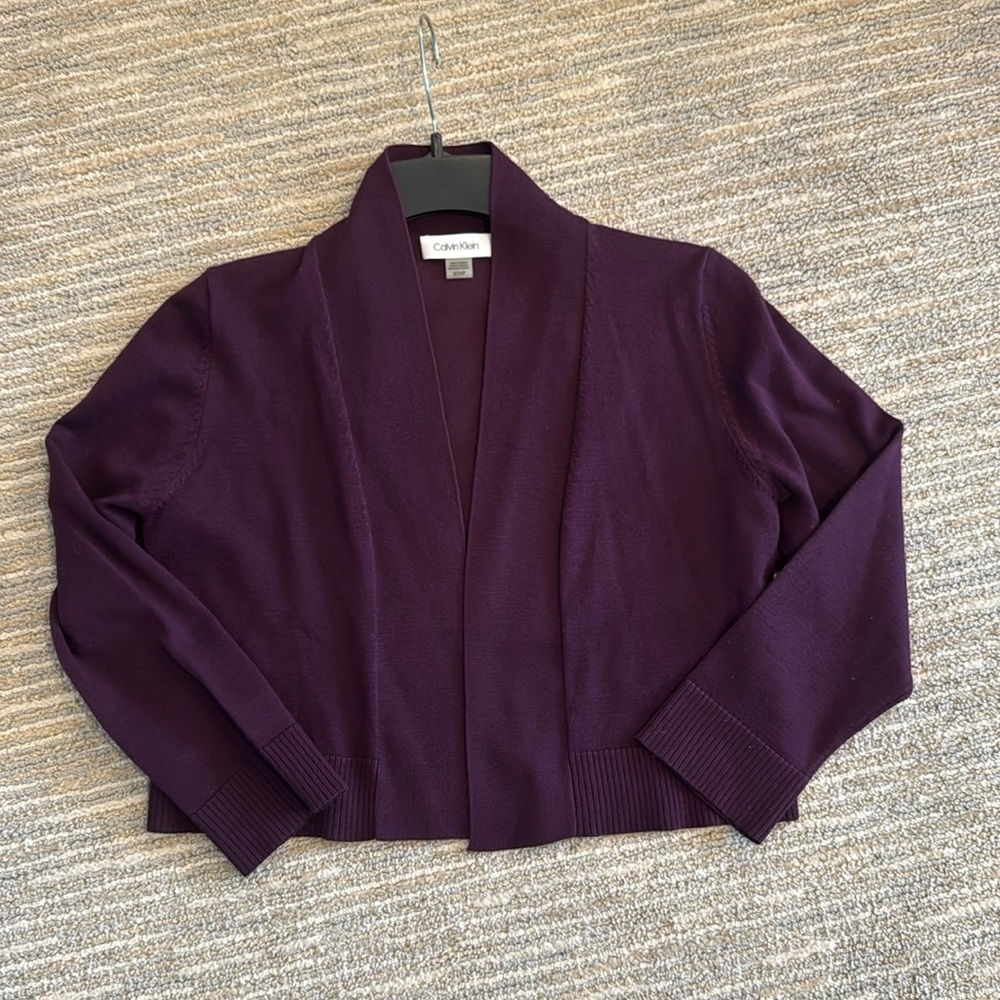 Calvin Klein shrug